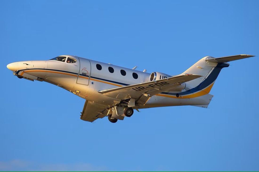 Light business jet in flight
