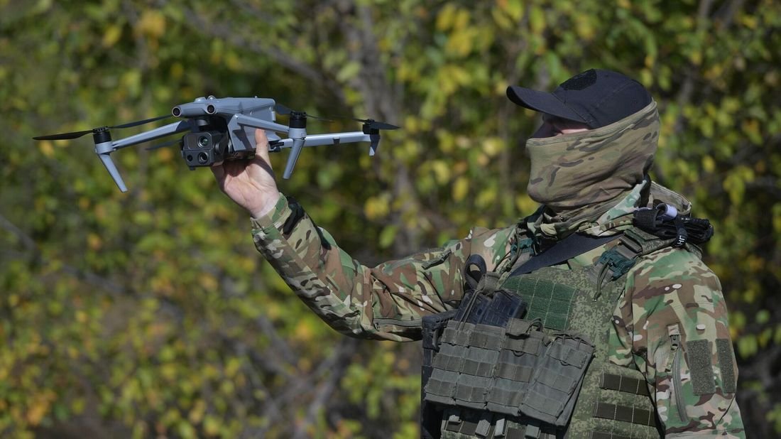 Operator preparing a tactical unmanned aerial vehicle